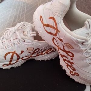 Skechers D Lites Glitzy City White & Gold.